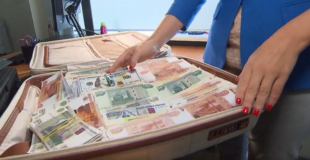 Russia's 'Crypto Queen' Received 'Suitcases Filled with Cash' as Prosecutors Conclude Inquiry1